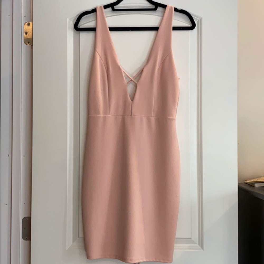 pink mini dress with exposed back